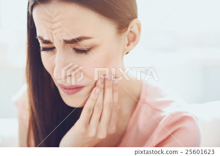 Close up of young unhappy woman which having Close up of young unhappy woman which having 25601623