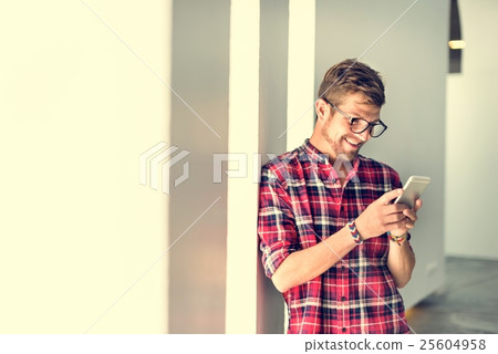 Young Man Using Browsing Smartphone Concept 25604958