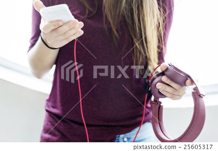 Young Woman Listening Music Concept 25605317