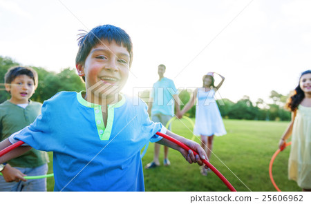 Stock Photo: Hula Hoop Enjoying Cheerful Outdoors Leisure Concept