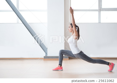 Nice well built woman standing in a special Nice well built woman standing in a special 25611062