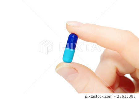 close up round white pill in hand close up round white pill in hand 25613395