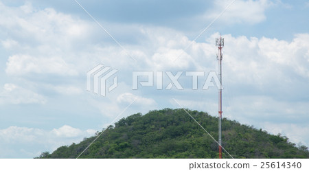 Telecommunications towers, located in a forest Telecommunications towers, located in a forest 25614340