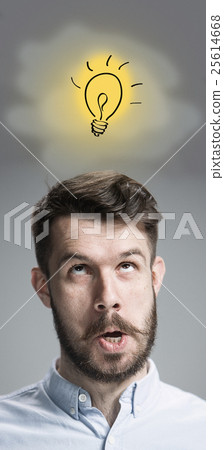 Man is looking reminiscing. Over gray background 25614668