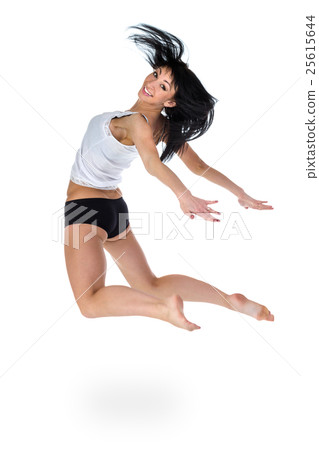 Aerobics fitness woman jumping isolated in full Aerobics fitness woman jumping isolated in full 25615644