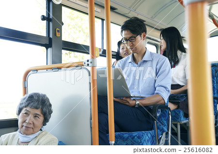 Bus commuting businessman Bus commuting businessman 25616082