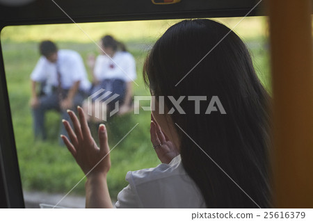 A couple of high school students after school 25616379