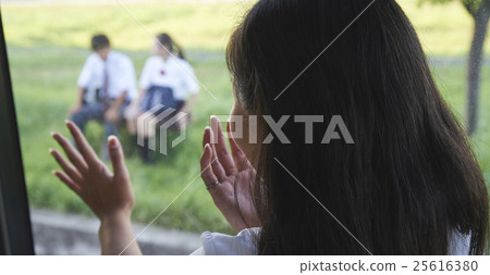 A couple of high school students after school 25616380