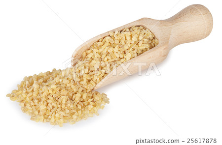 Bulgur in wooden scoop isolated on white 25617878