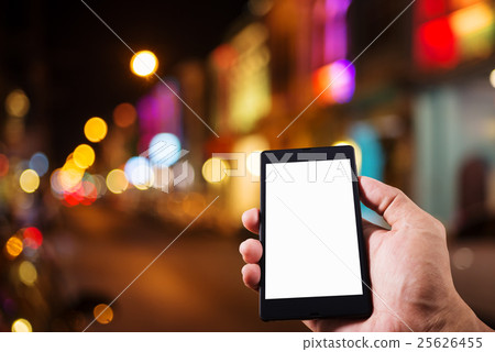 Hand man with smart phone mobile on night city 25626455