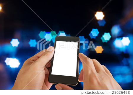 Hand man with smart phone mobile on night city 25626458