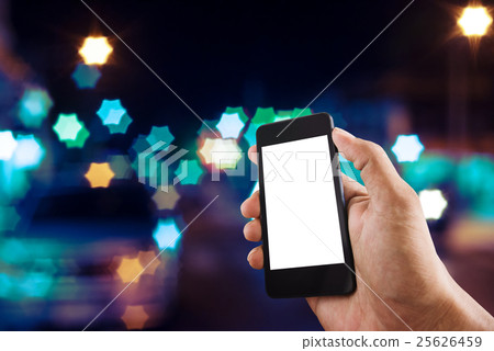 Hand man with smart phone mobile on night city 25626459