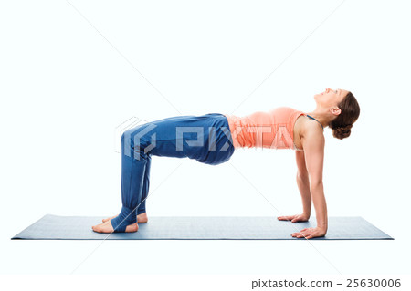 Woman doing Ashtanga Vinyasa Yoga asana 25630006