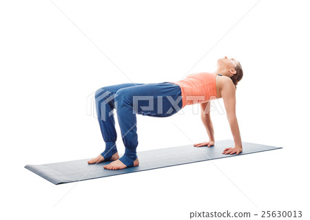 Woman doing Ashtanga Vinyasa Yoga asana 25630013