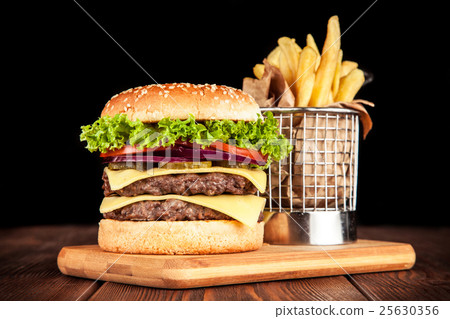 Delicious grilled burger 25630356