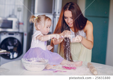 mother and daughter in the kitchen mother and daughter in the kitchen 25631880