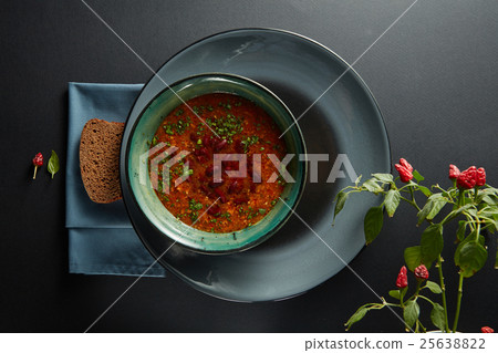 Bowl of minestrone soup with bread 25638822