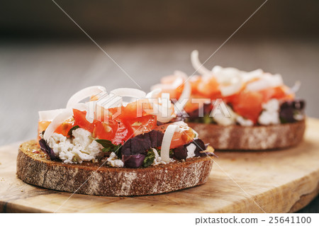 rye sandwich or bruschetta with ricotta, herbs and 25641100
