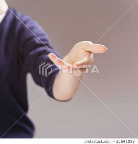 female teen hand to presenting or showing something selective focus female teen hand to presenting or showing something selective focus 25641832