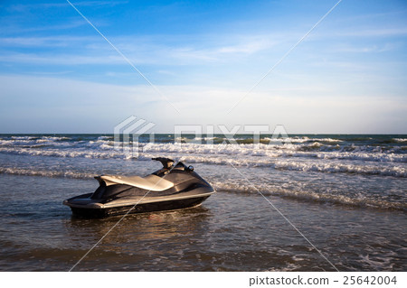 Jet ski on a beautiful beach. Jet ski on a beautiful beach. 25642004
