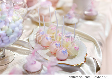Beautiful desserts, sweets and candy table Beautiful desserts, sweets and candy table 25644880