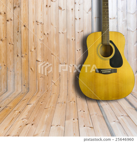 Acoustic guitar on wooden background texture Acoustic guitar on wooden background texture 25646960