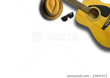 Acoustic guitar with hat and sunglasses on white Acoustic guitar with hat and sunglasses on white 25647071