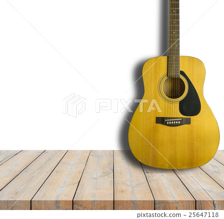 Acoustic guitar on wooden background texture Acoustic guitar on wooden background texture 25647118
