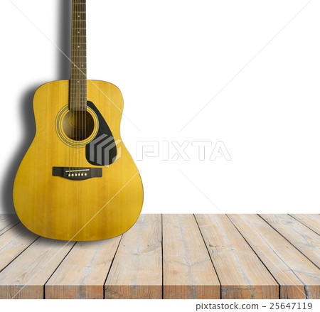Acoustic guitar on wooden background texture Acoustic guitar on wooden background texture 25647119