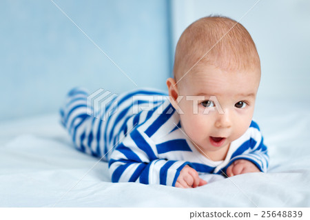 Cute little baby in bed 25648839