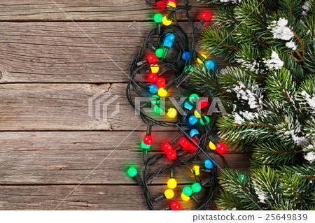 Christmas wooden background with snow fir tree Christmas wooden background with snow fir tree 25649839