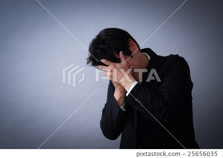 Men suffering from debt 25656035