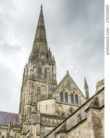 Salisbury cathedral under cloudy sky Salisbury cathedral under cloudy sky 25658985