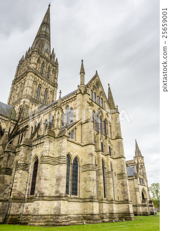Salisbury cathedral under cloudy sky Salisbury cathedral under cloudy sky 25659001