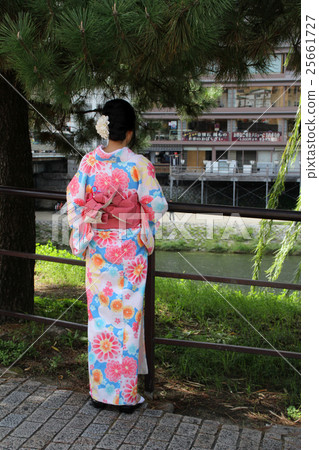 Kimono standing in the Kamogawa Kimono standing in the Kamogawa 25661727