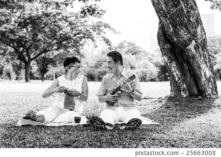 Senior Adult Couple Knitting Park Relaxation Concept 25663008