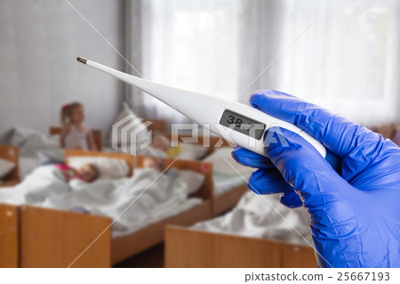 hand with electronic thermometer hand with electronic thermometer 25667193