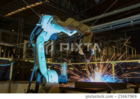 Robot welding assembly part in factory 25667969
