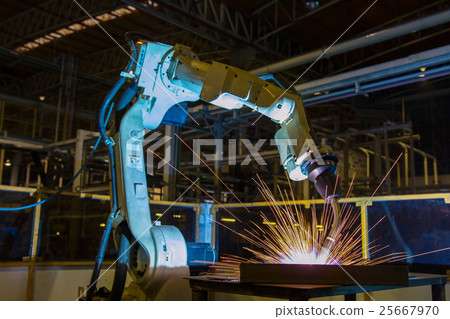 Robot welding assembly part in factory 25667970