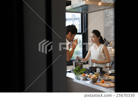 Couple doing cooking 25670330