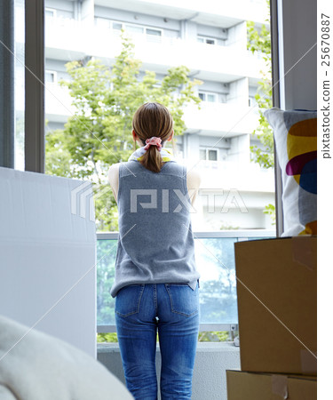 A woman looking at moving outside 25670887