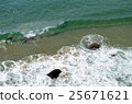 clear sea water with waves and rocks 25671621