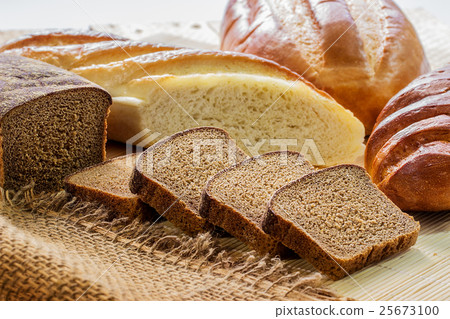 Rye bread and white long loaf. Rye bread and white long loaf. 25673100