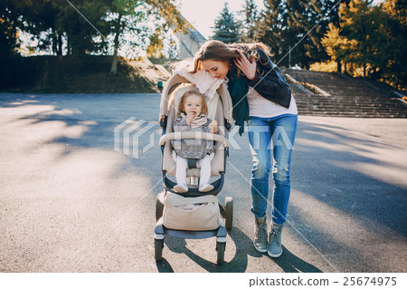 Family walk in the park 25674975