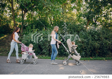 Family walk in the park 25674983