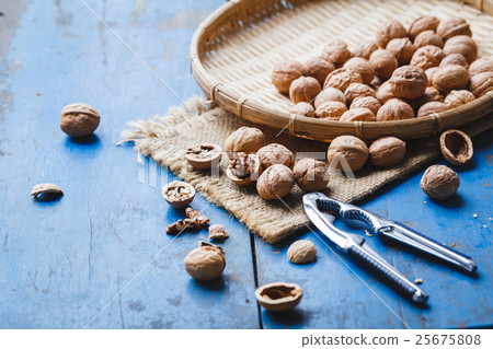 Walnuts Seeds on the old wood 25675808