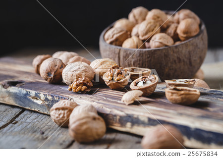 Walnuts Seeds on the old wood Walnuts Seeds on the old wood 25675834