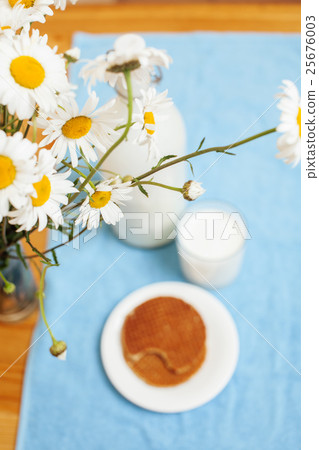 Simply stylish wooden kitchen with bottle of milk 25676003