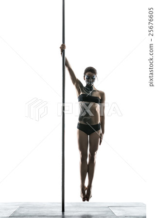 Female pole dancer with body-art on pylon Female pole dancer with body-art on pylon 25676605