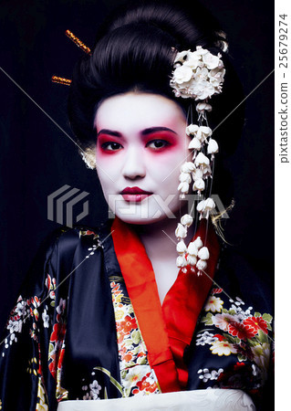 young pretty geisha in kimono with sakura and 25679274